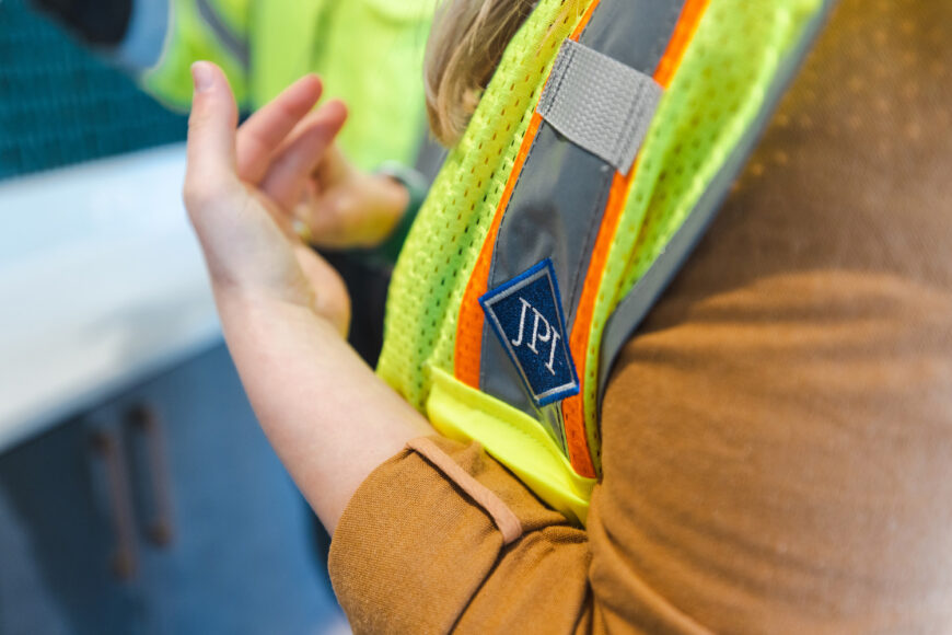 Construction worker points to something interesting