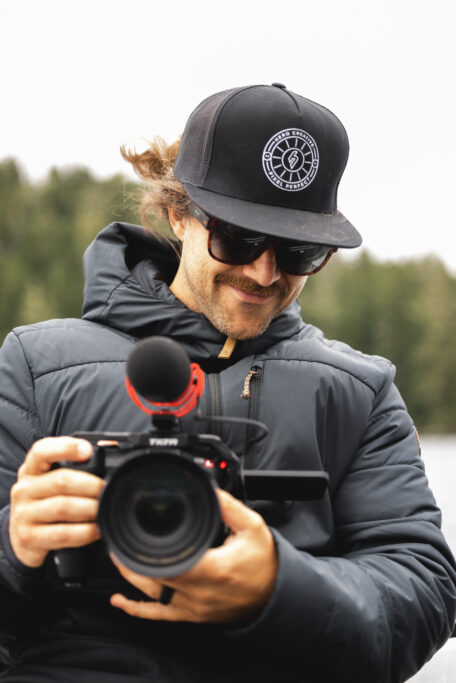 Mitch Olsen holding video camera
